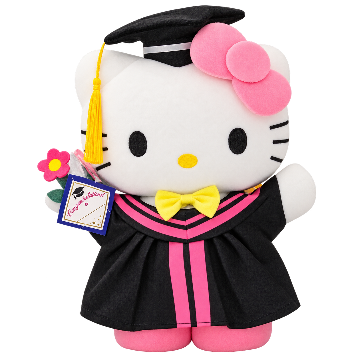 A white Kitty plush wearing a black graduation cap with yellow tassel, a black gown with pink trim, a pink bow and yellow bow tie, with the pictured flower and card details.