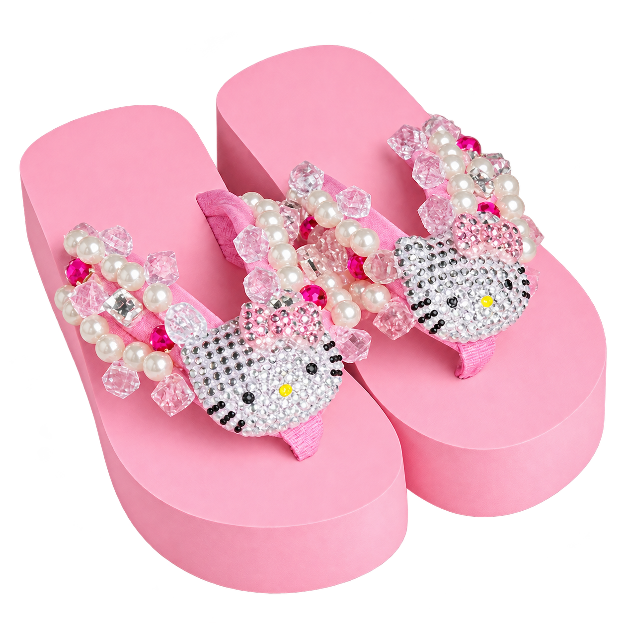 Pair of pink platform thong sandals with pearl-like and faceted bead decorations and sparkling Kitty-face ornaments with pink bows