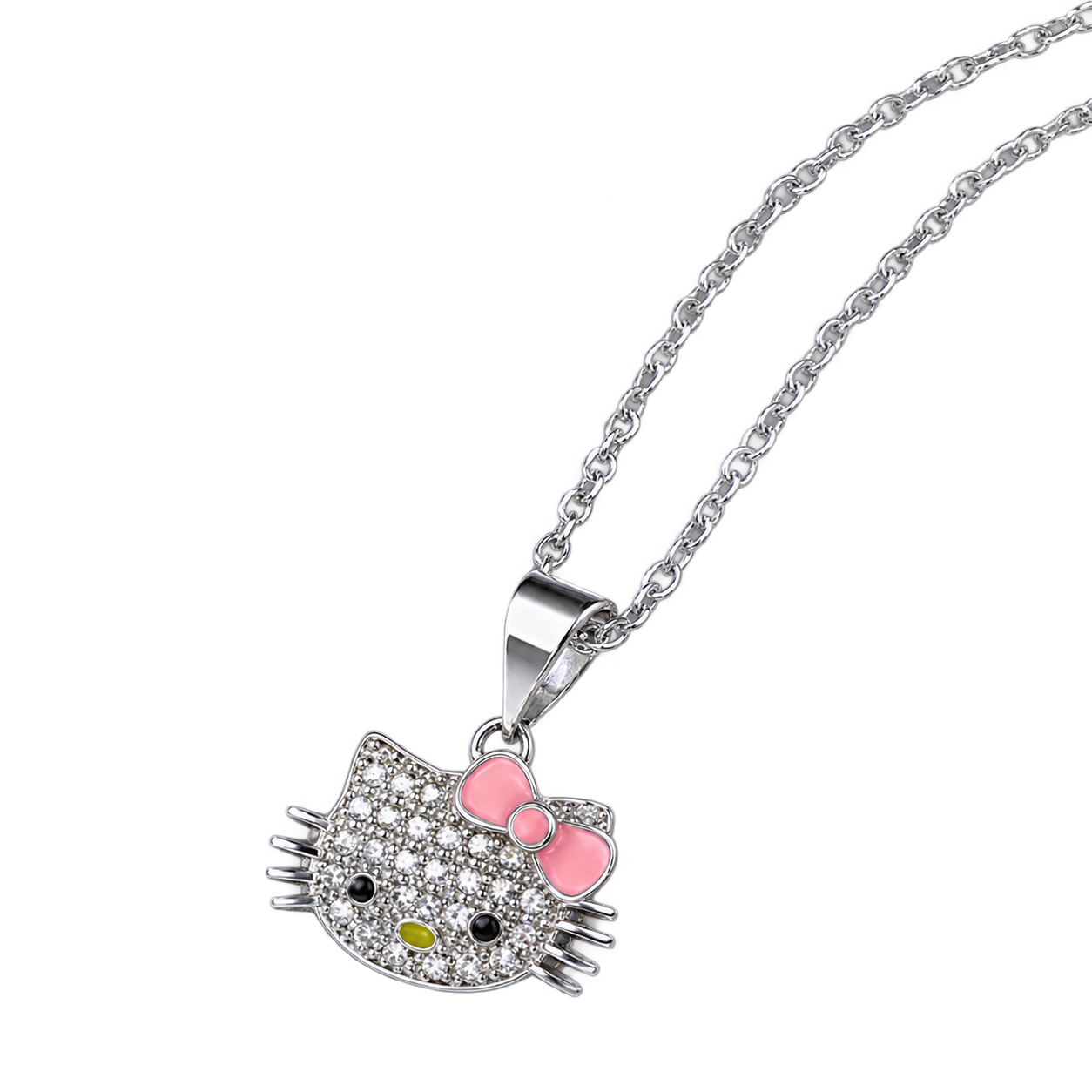 A silver-coloured Kitty face pendant with clear decorative stones, dark eyes, a yellow nose and a pale-pink bow, on a fine chain.