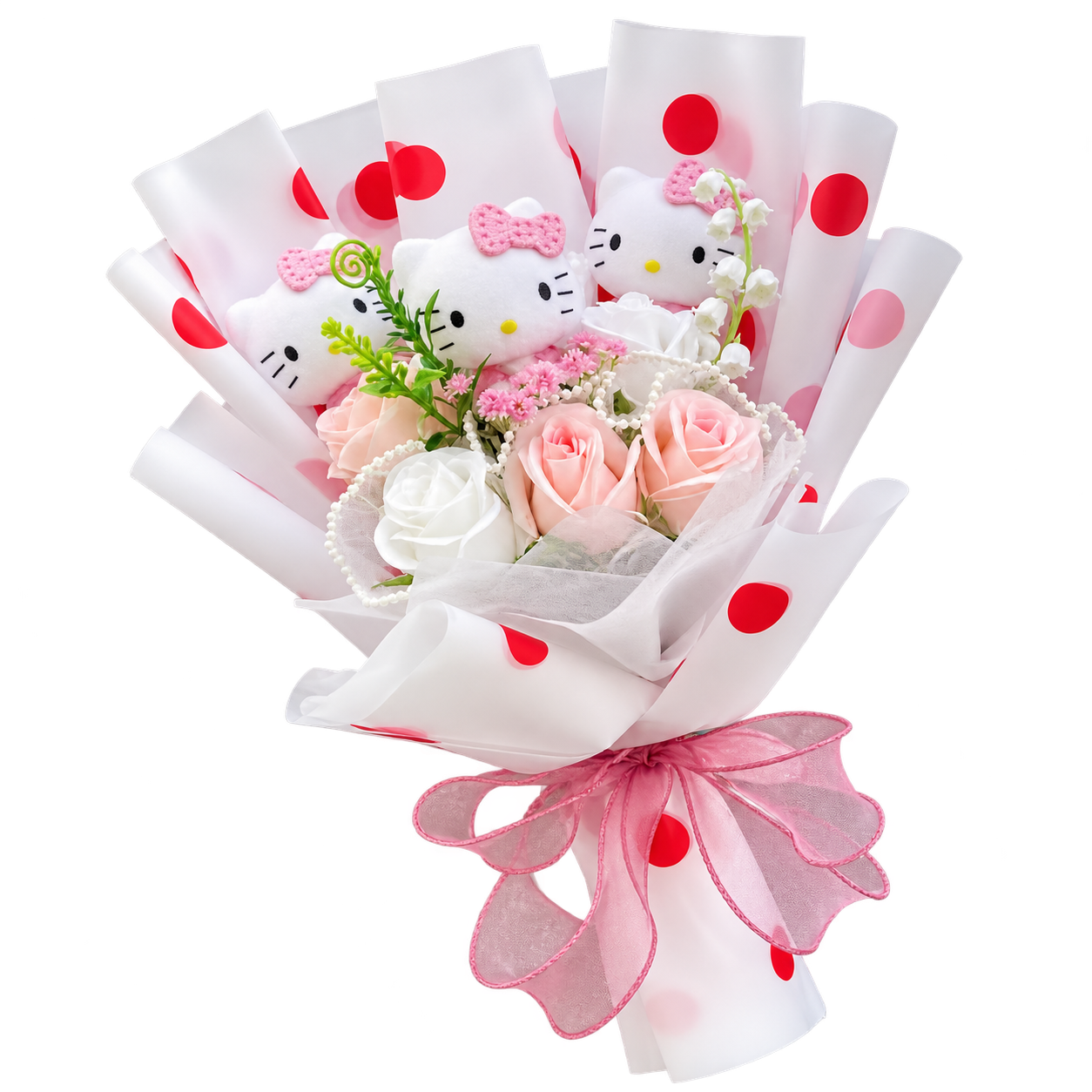 Kitty figures with pink bows among blush and white rose decorations, in white wrapping with red and pink polka dots and a pink ribbon.